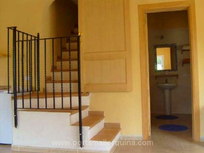 Escalera que lleva a los dormitorios