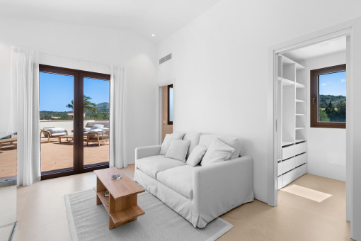 …con zona de estar privada y vestidor