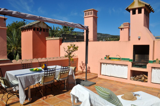 Terraza con zona de barbacoa