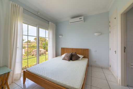 Dormitorio con aire accondicionado