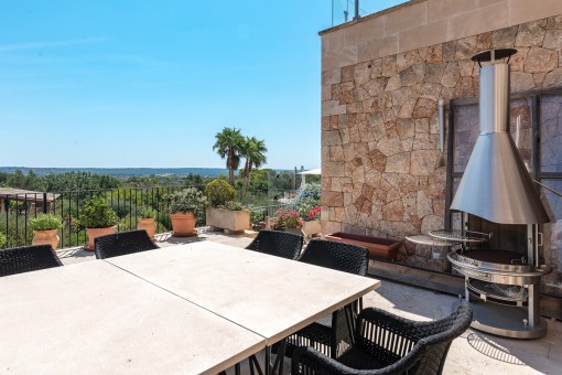 Terraza con zona de barbacoa