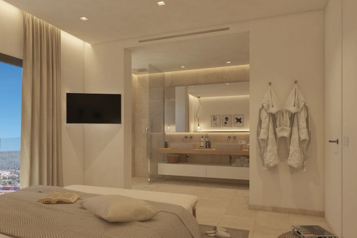 Dormitorio con baño en suite