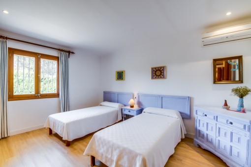Dormitorio con 2 camas individuales