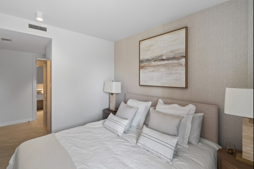 Elegante dormitorio doble con baño en suite