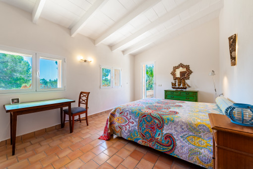 Dormitorio con terraza