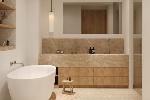 Baño en suite de alta gama con piedra natural y bañera exenta