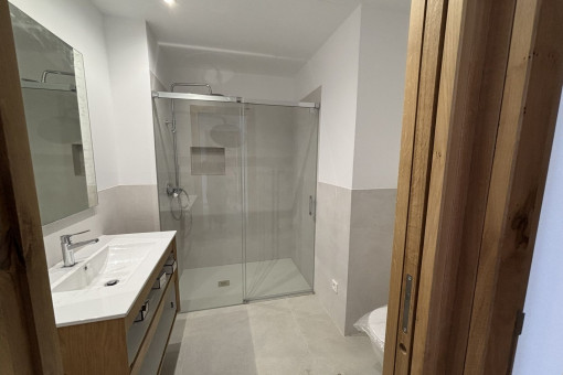 Baño con ducha a ras de suelo