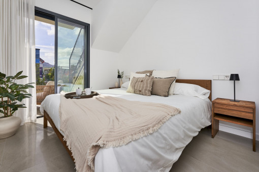 Dormitorio principal con acceso al jardín