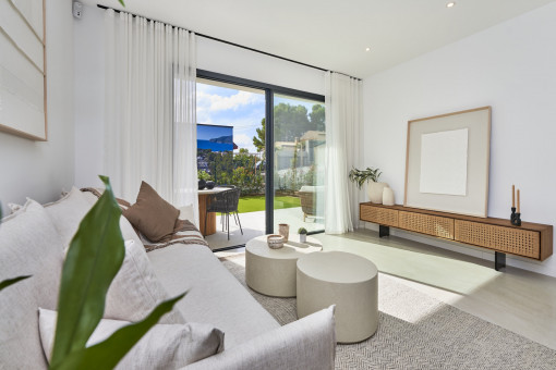 Salón abierto con acceso directo al jardín privado