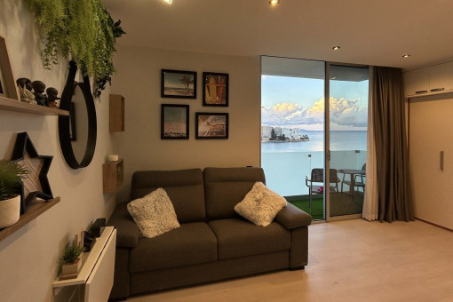Sala de estar con sofá cama