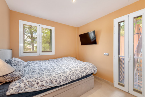 Dormitorio principal con patio privado