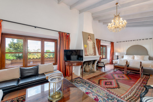 Master suite con zona de estar y vistas a las terrazas