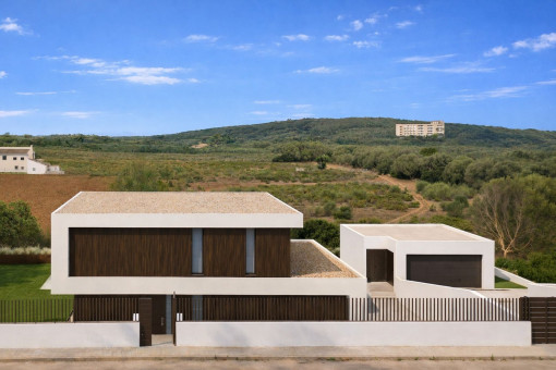 Vista de la fachada con garaje