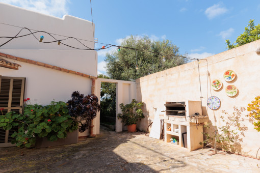 Terraza con zona de barbacoa