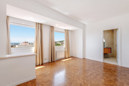 Dormitorio principal con baño en Suite