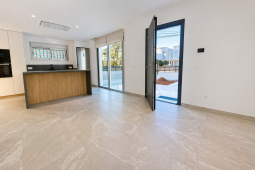 Cocina abierta con electrodomésticos integrados de Miele