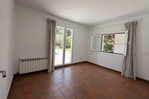 Dormitorio principal con acceso a la terraza