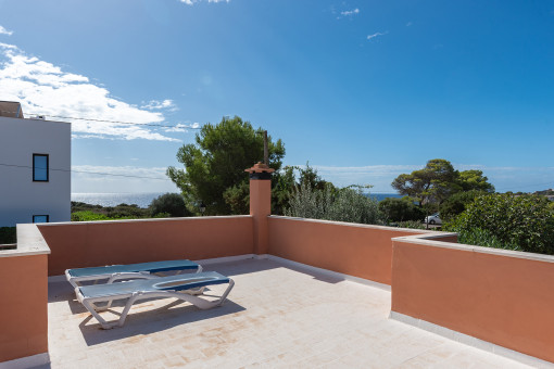 Terraza en la azotea con vistas al mar