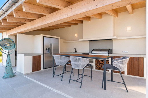 Casa de la piscina con bar y zona de barbacoa